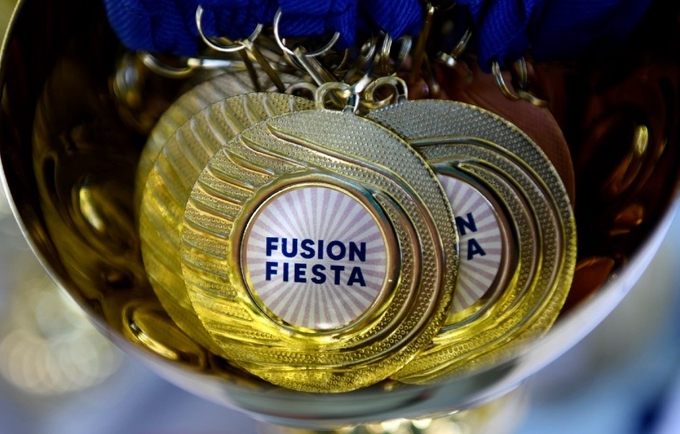 The medals that reads fusion fiesta