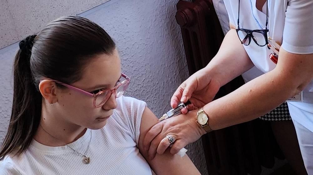 Girl getting a vaccine 